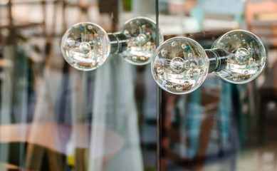 Glass on the front door handles 