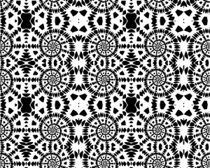 Seamless decorative pattern with spirals in a black and white colors 