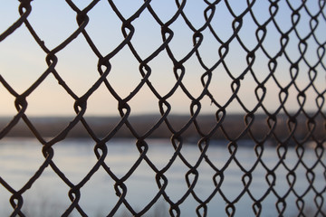 Fototapeta premium Решетка и река