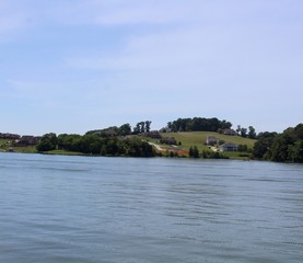 The beautiful green landscape on the hill near the lake.