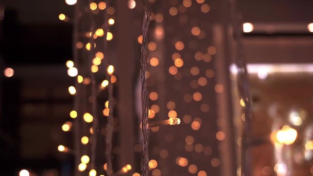 Slow pan shot of decorative lights.