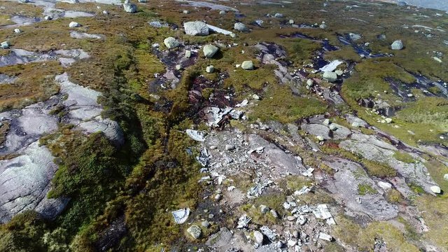 A UK WWII Bomber plane B-24 crashed on a mountain in southern Norway 1946, Fly over wreckage