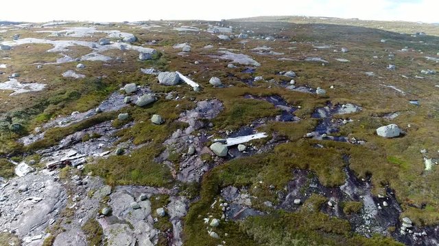 A UK WWII Bomber plane B-24 crashed on a mountain in southern Norway 1946, Reverse Fly over wreckage
