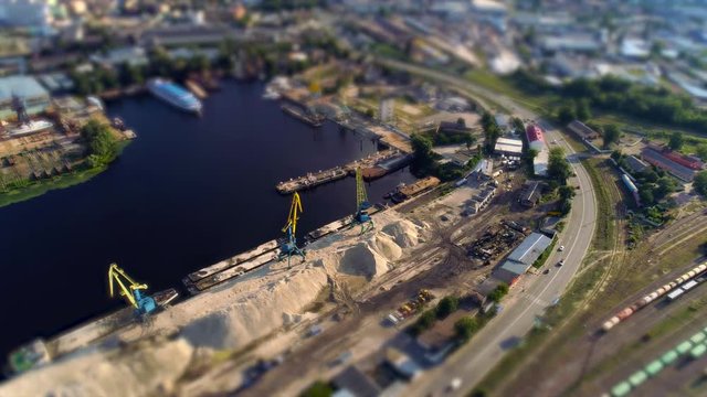 Aerial view of cranes at the quay tilt shift miniature