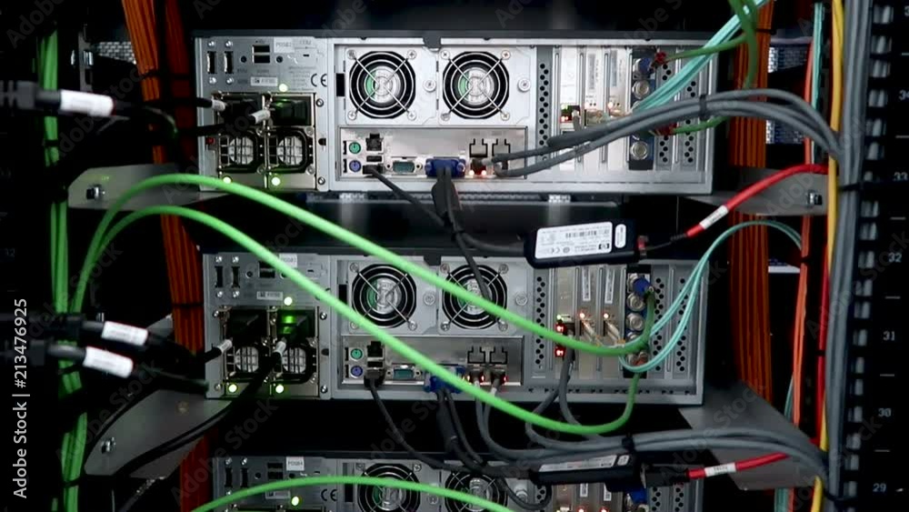 Wall mural back panel of powerful servers installed in the rack of the server room of the data center