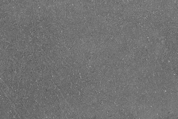 texture of gray asphalt with small stones, top view