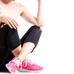 Woman legs sports leggings sneakers sports exercises on a white background isolation