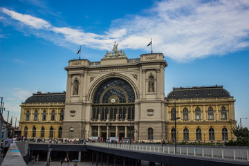 Fototapeta premium old railway station architecture facade in summer bright evening time