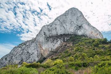 Mount Ifach in Calpe in Valencia, Spain, Europe. El Peñón de Ifach. In the background the sky...
