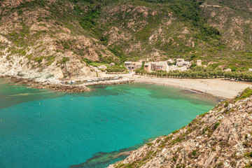 Turquoise Mediterranean and beach at Marine de Giottani in Corsica