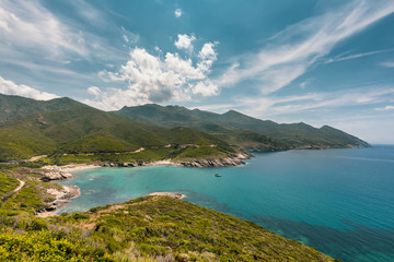 Obraz premium Yacht in the bay at Anse d'Aliso on Cap Corse in Corsica