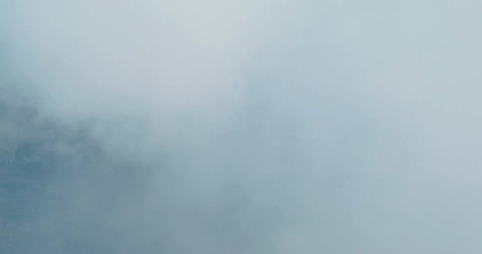 Mount Bromo volcanic crater smoke emission an aerial view, Indonesia