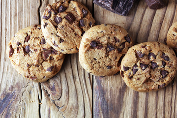Chocolate cookies on table. Chocolate chip cookies shot with chocolate