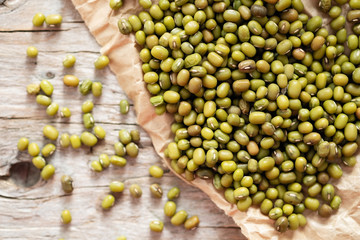 dry mung bean in ceramic bowl on wooden table