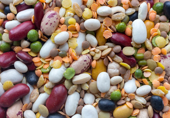 Mix of beans, peas, mung, lentil and kidney beans closeup. Organic healthy food. Vegeterian food concept. Mixed beans. Protein meal. Agriculture background.