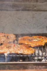 Slices of raw and grilled pork meat