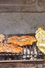 Slices of raw and grilled pork meat