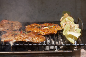 Slices of raw and grilled pork meat