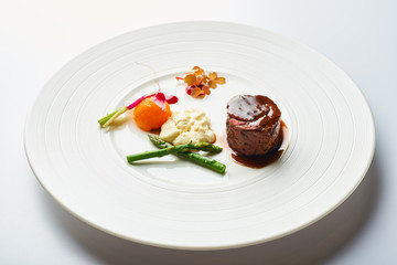 poultry roulade with mashed potatoes and asparagus