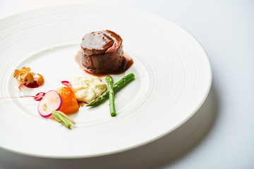 poultry roulade with mashed potatoes and asparagus