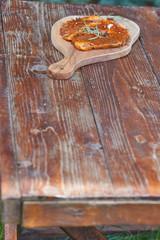 Slices of raw and grilles pork meat