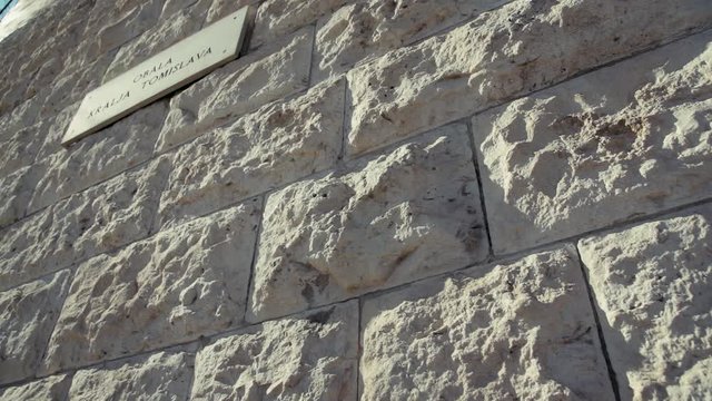 Limestone bricks under the bright sun. slow motion. zadar city / croatia