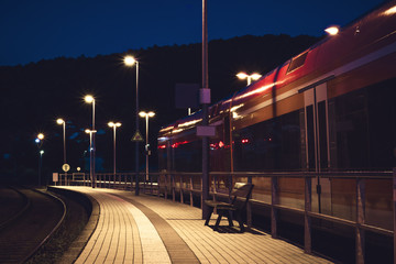 train is on the station at night