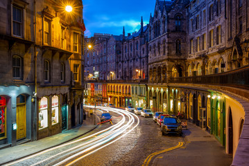 Fototapeta na wymiar night view of victoria street in edinburgh, scotland