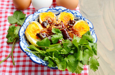 Fried Boiled Egg with Tamarind Sauce or Son-in-law Eggs.
 Thai style egg menu.