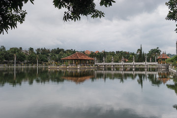 Bali, Indonesia: Panoramic view of building on lake shore with reflection in water