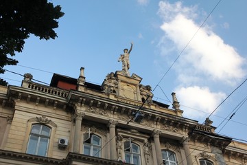 The Mercury sculpture on the old tenement house in Lviv, Ukraine