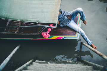 A man sit on the boat