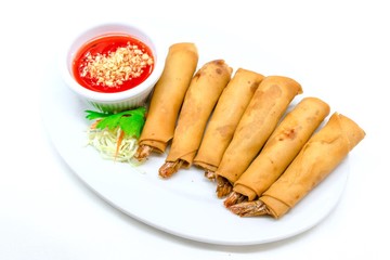 Shrimp rolls served with sweet sauce topping with ground peanut