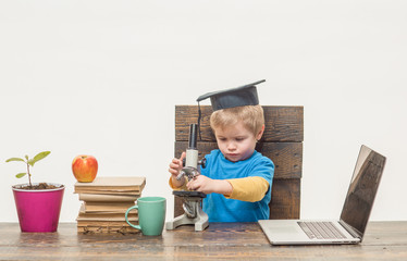 Science. Biology. Experiment. Education. Study. Modern technology concept. Thoughtful smart boy...