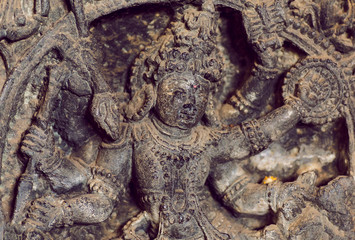 Body of warrior Lord Shiva, inside temple Hoysaleswara with fantastic carvings, India