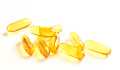 fish oil capsules isolated on white