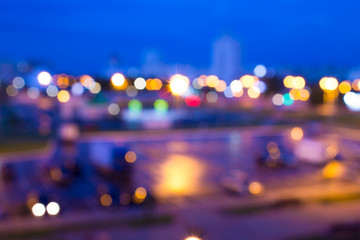 Defocused background of a cityscape at night. Abstract background with bokeh and lights