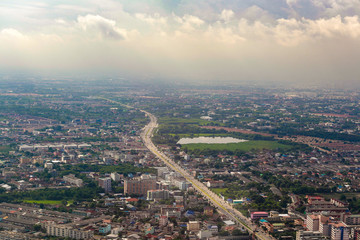 Fototapeta na wymiar Aerial cityscape view from airplane