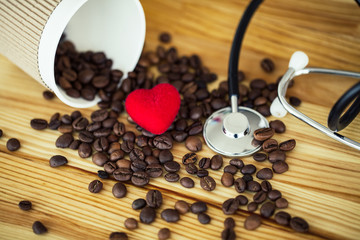 Good Morning. Paper Coffee Cup With Coffee Bean on The Wooden Table