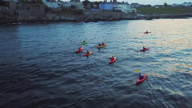aerial view of unrecognizable group of people kayaking near the Dalkey Island in Dublin, Ireland