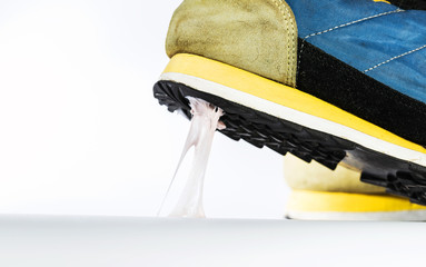 Simulation scenario of chewing gum on the floor, Stick with sneakers.