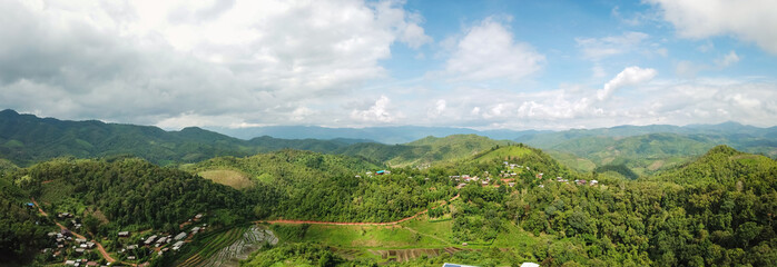 Fototapeta na wymiar Aerial photos A small village in the jungle in Chiang Mai, Thailand.