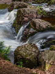 Rocks with waterfalls between