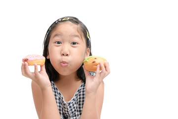 Happy cute girl is eating donut isolated