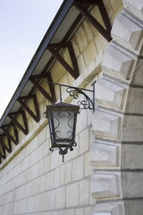 Photo of vintage Old Street Classic Iron Lantern On The House Wall, Close Up