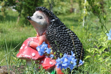 Hedgehog in mushrooms