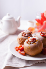 Home healthy healthy breakfast - tea, dried fruits, baked apples with honey. Cozy homemade tea