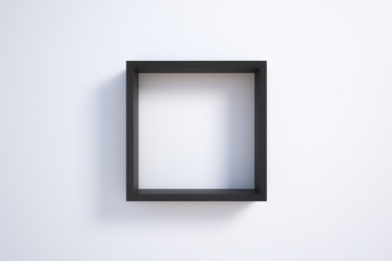 black picture frame on white wall