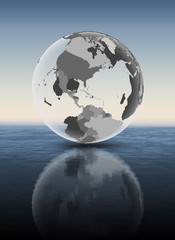 Bahamas on translucent globe above water