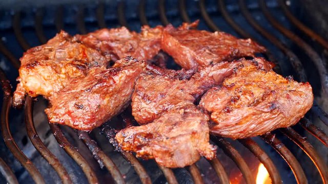 UHD closeup shot of the delicious beef on the grill